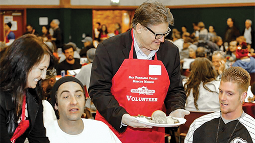 Volunteer serving food
