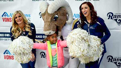 kid with Rams mascot